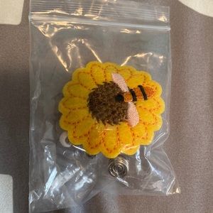 New sunflower badge reel